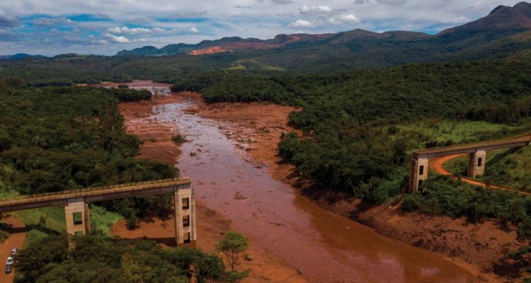 TOPSHOT - Aerial view of rail bridge taken down by a mudslide after the collapse, two days ago, of a dam at an iron-ore mine belonging to Brazil's giant mining company Vale near the town of Brumadinho, state of Minas Gerais, southeastern Brazil, on January 27, 2019. - Communities were devastated by a dam collapse that killed at least 37 people at a Brazilian mining complex -- with hopes fading for 250 still missing. A barrier at the site burst on Friday, spewing millions of tons of treacherous sludge and engulfing buildings, vehicles and roads. (Photo by Mauro PIMENTEL / AFP) (Photo credit should read MAURO PIMENTEL/AFP/Getty Images)