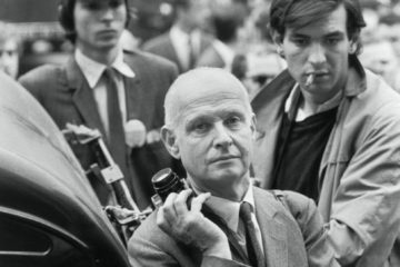 Photographer Henri Cartier-Bresson stands by with his camera during the 1968 Paris riots. In May of 1968, angry students and workers took to the streets to protest against widespread poverty, unemployment, and the conservative government of Charles de Gaulle. (Photo by Alain Nogues/Sygma/Sygma via Getty Images)