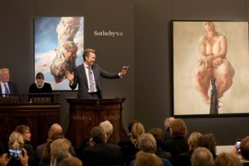 LONDON, ENGLAND - OCTOBER 05:  Oliver Barker, Chairman of Sotheby's Europe, fields bids for Jenny Saville’s 1992 painting 'Propped', the work that propelled her to international acclaim at Sotheby's Contemporary Art Evening Auction at Sotheby's on October 5, 2018 in London, England.  The painting sold tonight at Sotheby’s in London for £9.5m / $12.4 million / €10.8 million, setting a new auction record for a work by a living female artist. The painting was part of the collection of David Teiger, visionary collector and patron of the arts. Proceeds from this and from other works from his collection will benefit the Teiger Foundation, soon to be one of the world’s largest and most significant contemporary art foundations. (Photo by Tristan Fewings/Getty Images for Sotheby's) *** Local Caption *** Oliver Barker