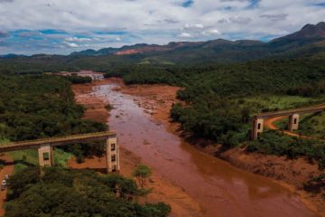 TOPSHOT - Aerial view of rail bridge taken down by a mudslide after the collapse, two days ago, of a dam at an iron-ore mine belonging to Brazil's giant mining company Vale near the town of Brumadinho, state of Minas Gerais, southeastern Brazil, on January 27, 2019. - Communities were devastated by a dam collapse that killed at least 37 people at a Brazilian mining complex -- with hopes fading for 250 still missing. A barrier at the site burst on Friday, spewing millions of tons of treacherous sludge and engulfing buildings, vehicles and roads. (Photo by Mauro PIMENTEL / AFP)        (Photo credit should read MAURO PIMENTEL/AFP/Getty Images)